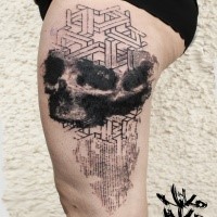 Abstract style black ink thigh tattoo of human skull with ornaments