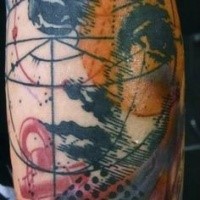 Abstract style colored arm tattoo of woman face with geometric picture