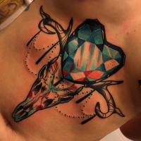 Abstract style colored belly tattoo of deers skull with heart shaped diamond