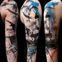 Abstract style colored big lighthouse with birds tattoo on sleeve