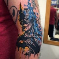 Abstract style colored elbow tattoo of Batman