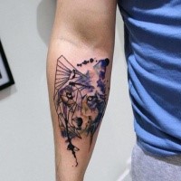 Abstract style colored forearm tattoo of wolf face