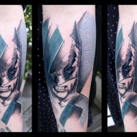 Abstract style colored forearm tattoo of Batman