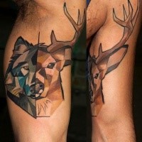 Abstract style colored half deer half wolf tattoo on biceps