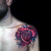 Abstract style colored large rose tattoo on shoulder