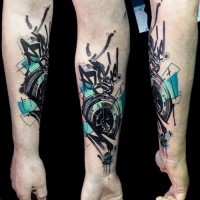 Abstract style colored little mechanic clock tattoo on wrist