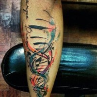 Abstract style colored musical DNA tattoo with lettering on arm