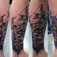 Abstract style colored old ship tattoo on arm