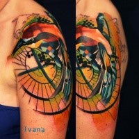 Abstract style colored shoulder tattoo of bird with ornaments