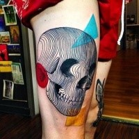 Abstract style colored thigh tattoo of human skull with geometrical figures