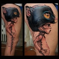 Abstract style colored thigh tattoo of boy with cat head