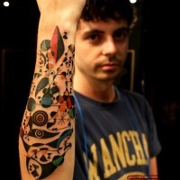 Abstract style colorful forearm tattoo of various symbols