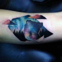 Abstract style colorful night tattoo on arm
