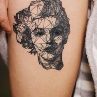 Abstract style geometrical painted Merlin Monroe portrait tattoo on thigh