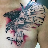 Abstract style half colored eagle tattoo on chest