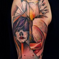 Abstract style painted and colored tribal people tattoo on shoulder