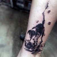 Abstract style painted black ink little dog tattoo on ankle