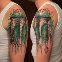 Abstract style painted colored big bridge tattoo on shoulder length