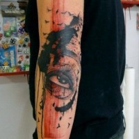 Abstract style painted colored tattoo with birds and big eye on sleeve