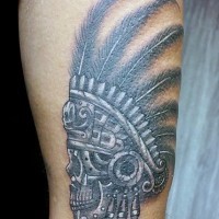 Accurate looking black and white thigh tattoo of tribal skull