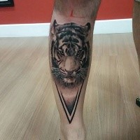 Accurate painted black ink leg tattoo of tiger head with triangle part