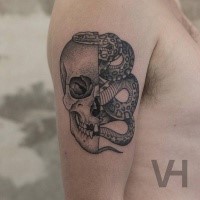 Accurate painted by Valentin Hirsch shoulder tattoo of split human skull with snake