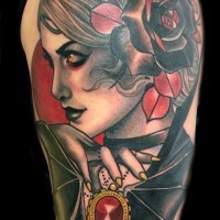 Accurate painted colorful shoulder tattoo of mystical woman portrait with flower in hair