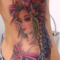 Accurate very beautiful colored big Asian woman portrait tattoo on side stylized with flowers in hair