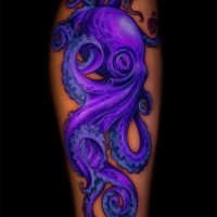 Adorable purple octopus tattoo on leg