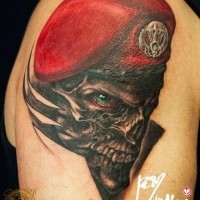 Alien like cool detailed and colored military monster skull tattoo on shoulder