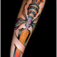 Amazing dagger morphing bee forearm tattoo