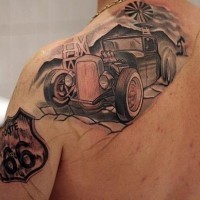 Amasing old car on road tattoo on shoulder