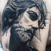 Amazing black gray portrait of jesus in a crown of thorns tattoo