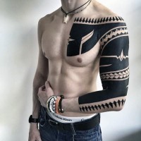 Amazing black ink tribal ornament tattoo on sleeve and chest