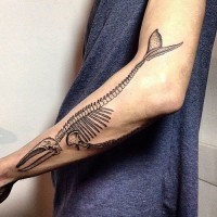 Amazing black skeleton whale forearm tatoo