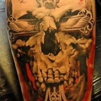 Amazing designed creepy cult skull with symbols tattoo on arm