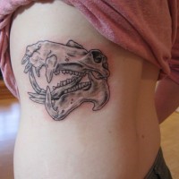 Amazing gray-ink hippo skull tattoo on side