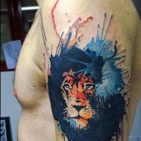 Amazing lion's portrait colored shoulder tattoo in watercolor style