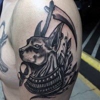 Amazing looking black ink shoulder tattoo of saint dog with plants