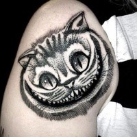 Amazing looking dot style shoulder tattoo of smiling fantasy cat head