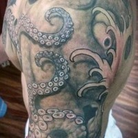 Amazing painted and colored big octopus tattoo on shoulder