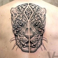 Amazing symmetrical designed upper back tattoo of leopard head with human skull by Valentin Hirsch