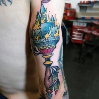 Amazing torch shaped colored burning castle tattoo on arm