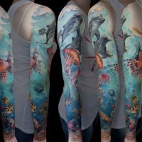 Amazing very realistic colored underwater life tattoo on sleeve