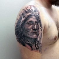 American native black and white detailed on shoulder tattoo of Indian chief