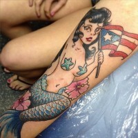 American native multicolored seductive mermaid tattoo on forearm with national flag