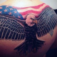 American native painted and colored eagle with national flag tattoo on upper back