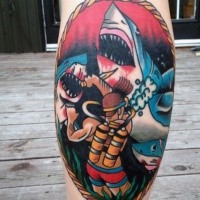 American traditional style colored diver with sharks tattoo on leg