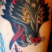 American traditional style colored shoulder tattoo of hell dog head