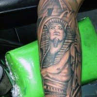 Ancient Egypt themed black ink forearm tattoo of Pharaoh and pyramid